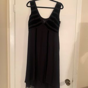 Flowy black and velvet dress.